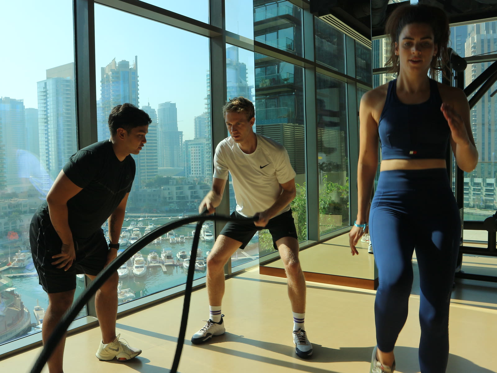 ATHLI Club members working through a battle-rope round together