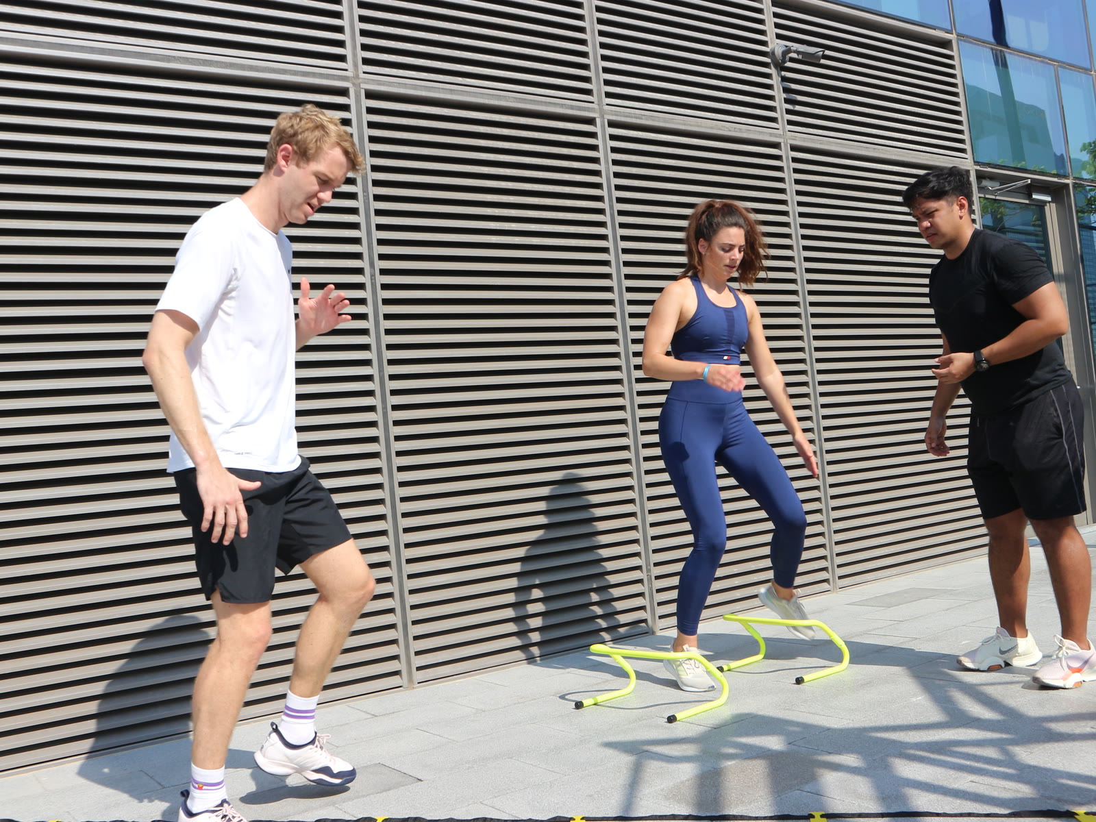 A team working through an outdoor ATHLI session together
