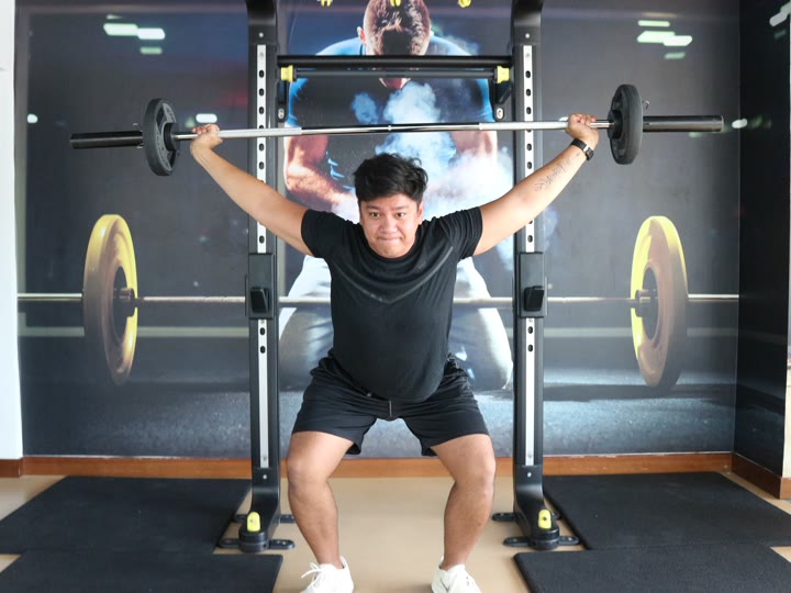An ATHLI member following a structured training plan at the gym